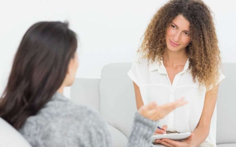 Two women talking to each other